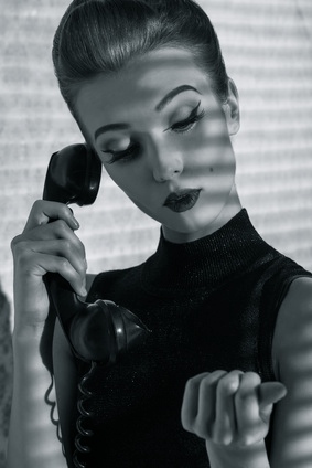 gossip girl talking on vintage phone